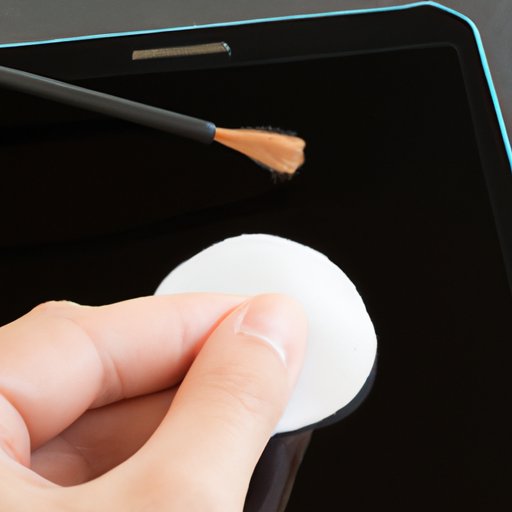 Cleaning the Edges of the Screen with a Cotton Swab